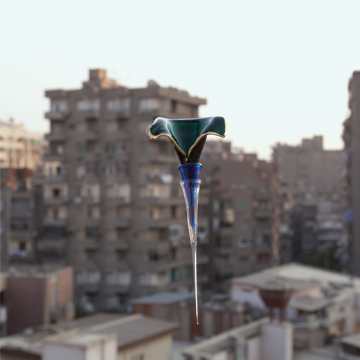 Hassan Khan, A glass object photographed as a way of collecting the world around it, 2013. photographic print on paper, 40 x 40 cm  © Courtesy of the artist and Chantal Crousel